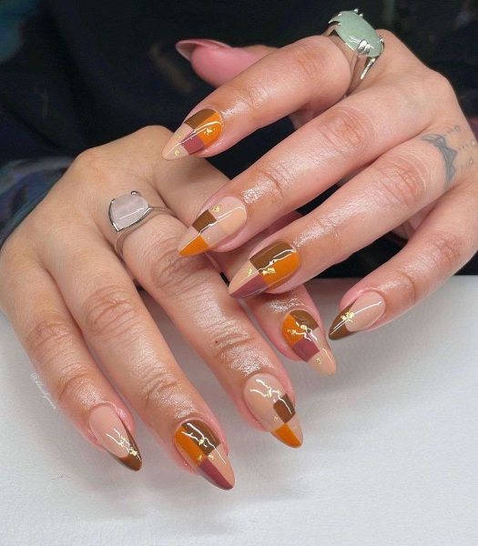 Thanksgiving nail designs can be as simple or intricate as you'd like. Browse 40 examples to serve as inspiration for a festive manicure this season.