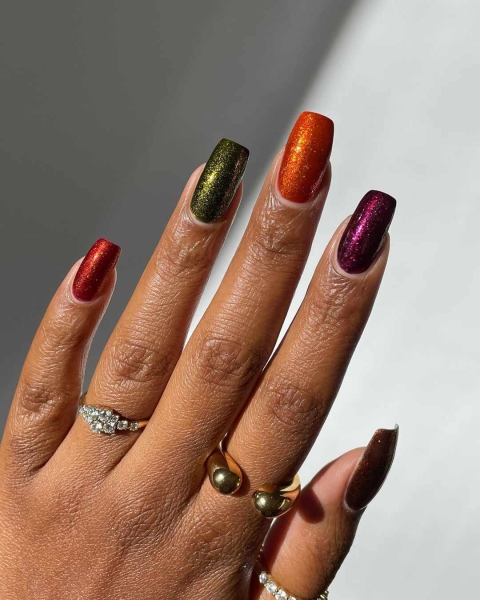 Thanksgiving nail designs can be as simple or intricate as you'd like. Browse 40 examples to serve as inspiration for a festive manicure this season.