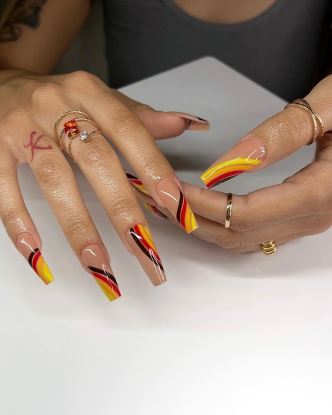 Thanksgiving nail designs can be as simple or intricate as you'd like. Browse 40 examples to serve as inspiration for a festive manicure this season.