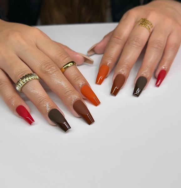 Thanksgiving nail designs can be as simple or intricate as you'd like. Browse 40 examples to serve as inspiration for a festive manicure this season.