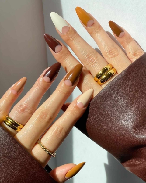 Thanksgiving nail designs can be as simple or intricate as you'd like. Browse 40 examples to serve as inspiration for a festive manicure this season.