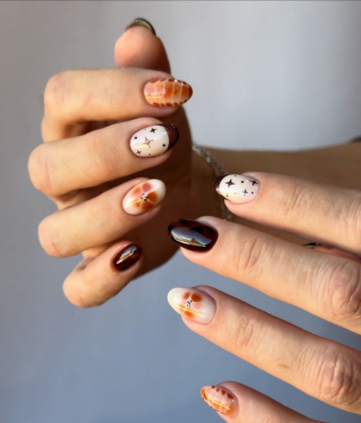 Thanksgiving nail designs can be as simple or intricate as you'd like. Browse 40 examples to serve as inspiration for a festive manicure this season.