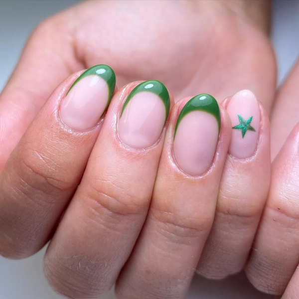 Celebrate the season with a festive manicure. Green Christmas nails run the gamut from minimalist to maximalist—there's something for everyone on the list.