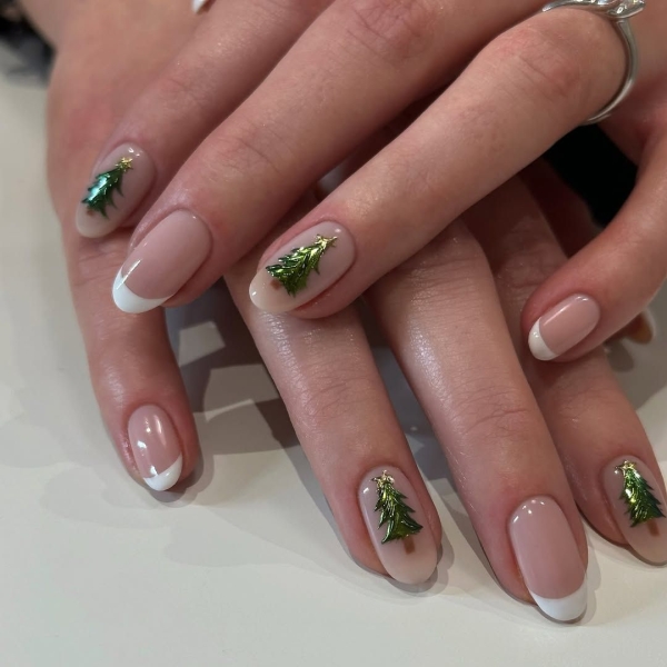 Celebrate the season with a festive manicure. Green Christmas nails run the gamut from minimalist to maximalist—there's something for everyone on the list.