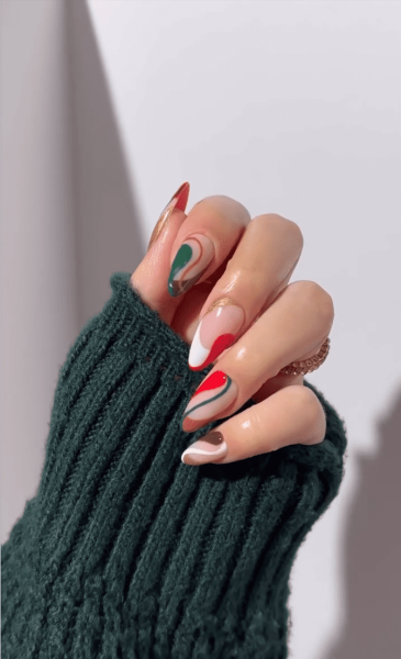 Celebrate the season with a festive manicure. Green Christmas nails run the gamut from minimalist to maximalist—there's something for everyone on the list.