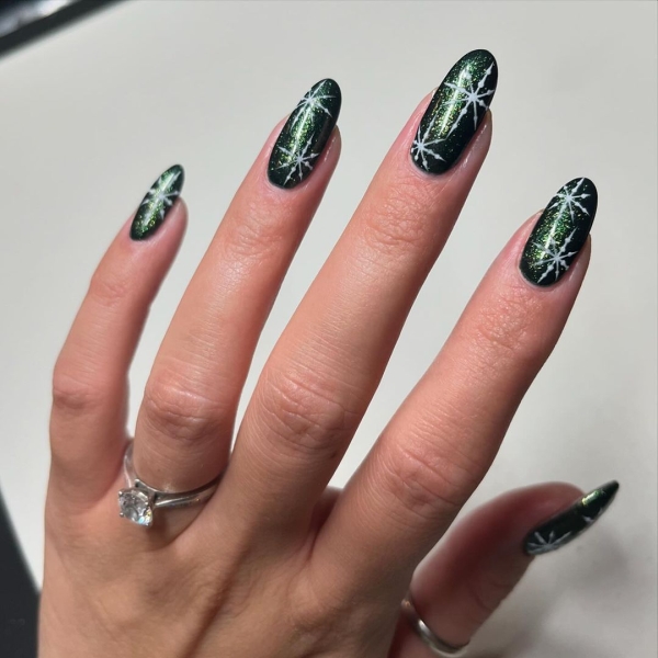 Celebrate the season with a festive manicure. Green Christmas nails run the gamut from minimalist to maximalist—there's something for everyone on the list.