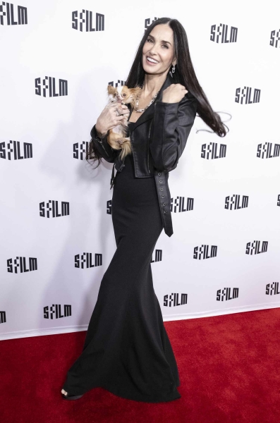 Demi Moore gave the classic black dress an edgy update with a cropped leather jacket at the San Francisco Film Awards Night. See photos of her look, here.