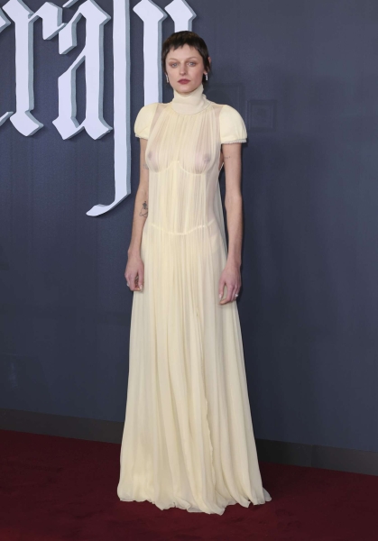 Emma Corrin freed the nipple and their cheeky underwear in a sheer butter-yellow, Victorian-style gown at the London premiere of 'Nosferatu.' The show-stopping ensemble recalled a costume they wear in the gothic horror film.