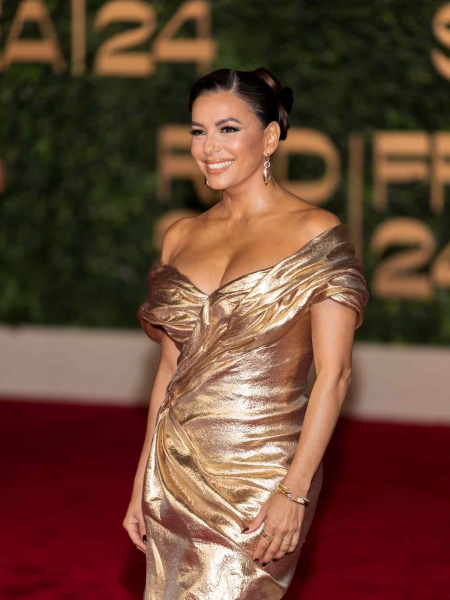 Eva Longoria appeared at the opening night of the Red Sea Film Festival in Saudi Arabia wearing a glimmering gold gown with a structural design.