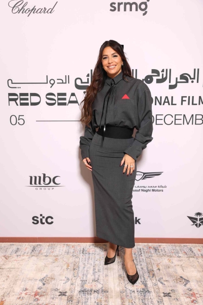 Eva Longoria stepped out in a retro flight attendant-inspired dress paired with divisive heels as she stepped out at a Red Sea Film Festival photocall on Friday, December 6. See the look, here.