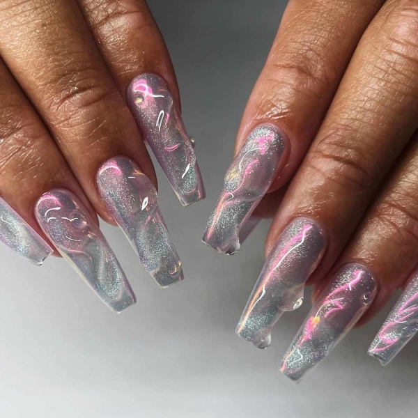 Every year comes with a bevy of nail art inspo. We chatted with three nail artists to determine the top 2025 nail trends. Ahead, peruse 12 minimalist and bold nail art ideas, and pick whichever best fits your aesthetic.