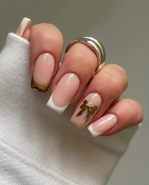 Everything is better when wrapped up in a bow—even your nails! From dazzling metallic ribbons to gentle cream-colored ties, a dainty bow is the perfect way to top off an accent nail (or every nail, for that matter).