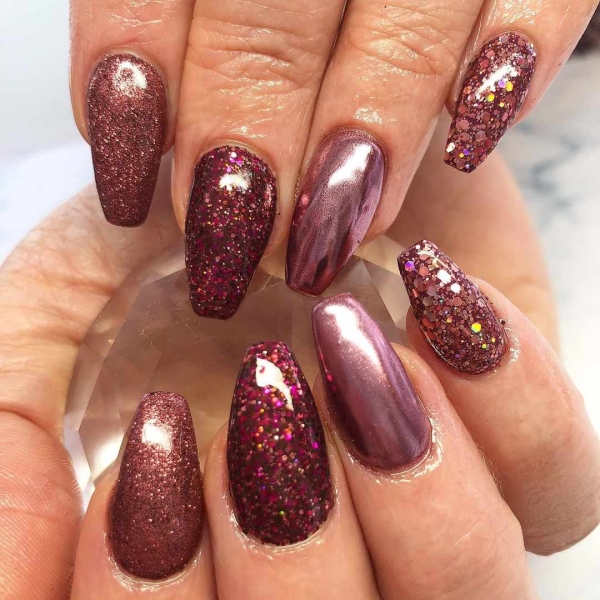 Few shades are as timeless as burgundy when it comes to fall and winter nail colors. This season, you can amplify its impact with a chrome effect, too. Scroll through 25 burgundy chrome nail looks for inspiration here.