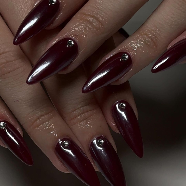 Few shades are as timeless as burgundy when it comes to fall and winter nail colors. This season, you can amplify its impact with a chrome effect, too. Scroll through 25 burgundy chrome nail looks for inspiration here.