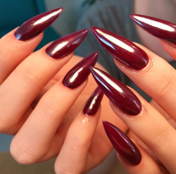 Few shades are as timeless as burgundy when it comes to fall and winter nail colors. This season, you can amplify its impact with a chrome effect, too. Scroll through 25 burgundy chrome nail looks for inspiration here.