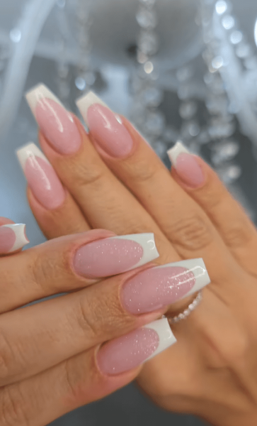 French manicures are a great option for a neutral nail look that goes with everything. For something a little more fun, but still sleek, try a glitter French manicure. Here, 15 gorgeous variations.