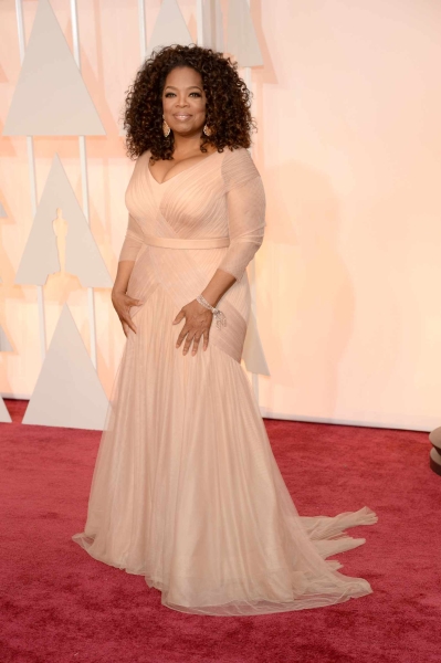 From Versace to Vera Wang, you never know what she will step out in next, but you can be sure it’s fitting of her regal red carpet presence. Read on for a walk down memory lane through some of Oprah Winfrey’s most unforgettable style hits from the 1980s through now.