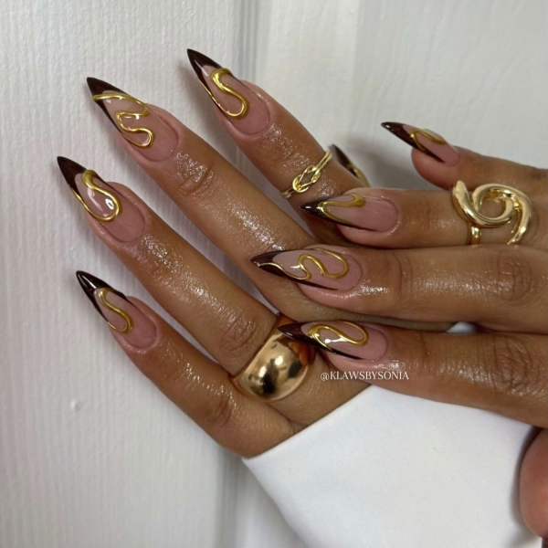 Gold is synonymous with luxury and glamour, making it perfect for the upcoming festive season. Scroll through these 20 stunning gold nail looks that we think you'll absolutely love.