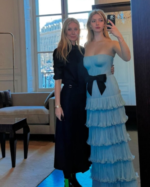 Gwyneth Paltrow's lookalike daughter Apple Martin made her debutante debut in Paris in a custom Valentino gown that took 750 hours to make on Nov. 30. The college student was joined by her mom, dad Chris Martin, brother Moses, and grandma Blythe Danner.