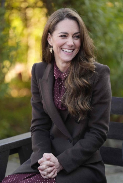 Kate Middleton welcomed Emir of the State of Qatar, Sheikh Tamim bin Hamad Al Thani, and his wife, Her Highness Sheikha Jawaher bint Hamad bin Suhaim Al Thani for their royal visit to London—and she wore a monochromatic maroon look for the occasion.