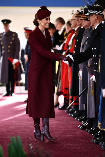 Kate Middleton welcomed Emir of the State of Qatar, Sheikh Tamim bin Hamad Al Thani, and his wife, Her Highness Sheikha Jawaher bint Hamad bin Suhaim Al Thani for their royal visit to London—and she wore a monochromatic maroon look for the occasion.