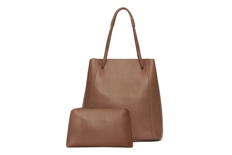 Katie Holmes wore winter’s no. 1 accessory: a practical bucket bag that is spacious, structured, and sleek for everyday use. I found eight lookalikes of her chocolate brown tote at Amazon, Nordstrom, Coach, and more, starting at $33.