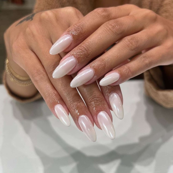 Looking for a little end-of-year mani inspo? Here, manicurists reveal their favorite December nail ideas. Along with the expected holly-jolly palettes, the nail artists we spoke with forecast bows, silver and gold accents, elevated French tips, and frosty chrome finishes to reign supreme this holiday season.