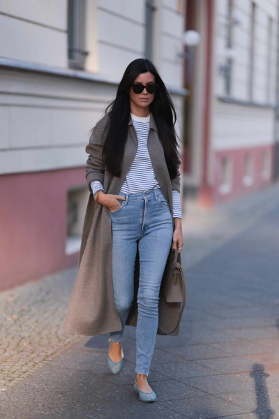 Skinny jean outfits will never go out of style. To prove it, we're sharing how to style skinny jeans 16 different ways, as seen on street style stars.