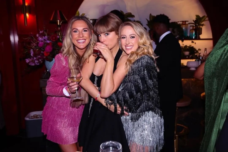 Taylor Swift celebrated her 35th birthday at an Eras Tour-themed party in Kansas City and combined all of her fashion eras into one dress. See her full look, here.