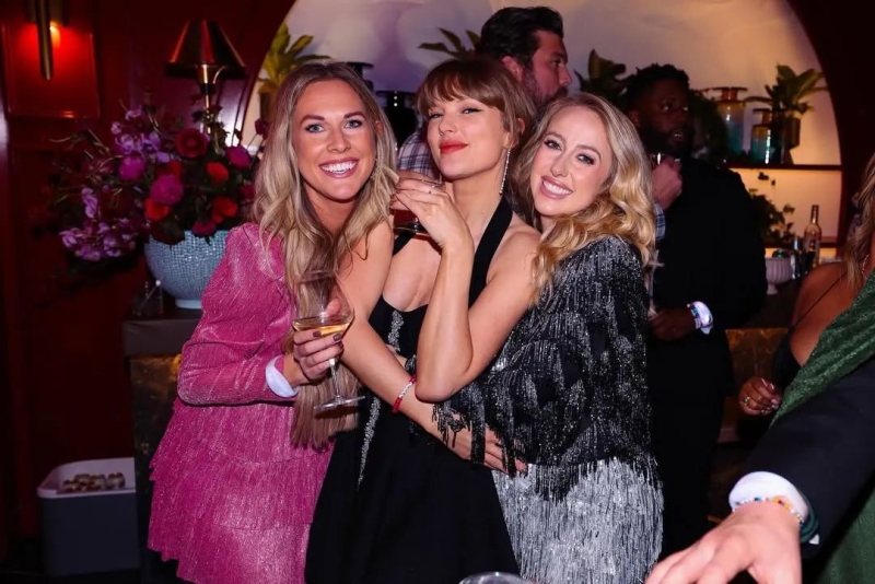 Taylor Swift celebrated her 35th birthday at an Eras Tour-themed party in Kansas City and combined all of her fashion eras into one dress. See her full look, here.