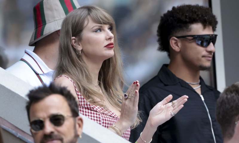 Taylor Swift visited the Children's Mercy Hospital in Kansas City on December 12 and was seen in social media clips talking about Travis Kelce, signing books, and posing with young fans.