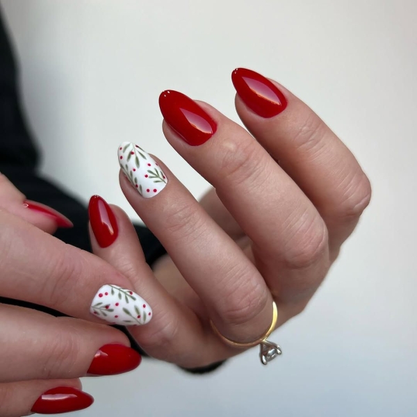 The color red is synonymous with Christmas and warm holiday cheer. Here, scroll through 18 red Christmas nail ideas for a festive touch this season.