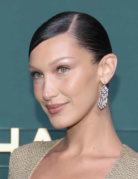 We love Bella Hadid's signature chocolate-brown hair color, her sleek slickbacks with not a single hair out of place, and her ability to pull off any style of bangs, from blunt and rounded to long and piece-y. Explore a gallery of her best looks.