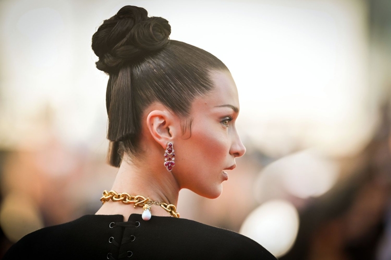 We love Bella Hadid's signature chocolate-brown hair color, her sleek slickbacks with not a single hair out of place, and her ability to pull off any style of bangs, from blunt and rounded to long and piece-y. Explore a gallery of her best looks.