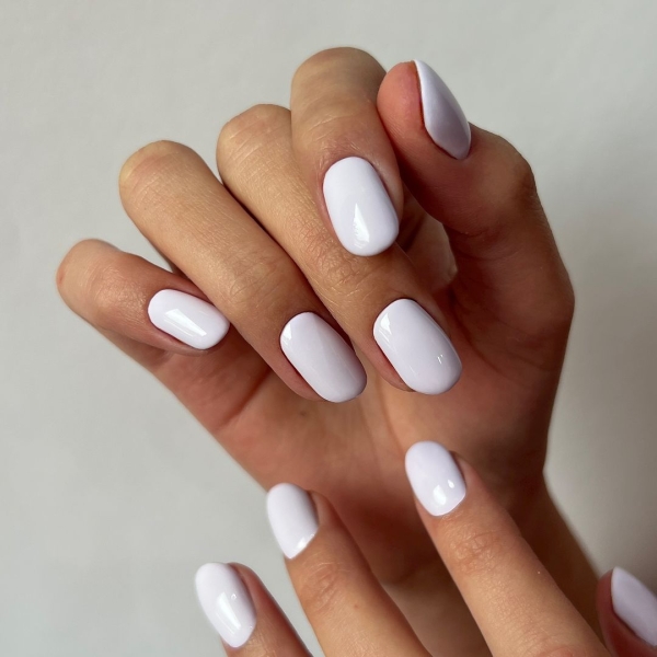 Whether you go for a classic French manicure, a milky-white base, or pop on a glittery top coat, you'll be left with a look that's festive for the season in an understated way. Browse through 20 stunning winter white nail ideas and screenshot your faves for your next manicure.