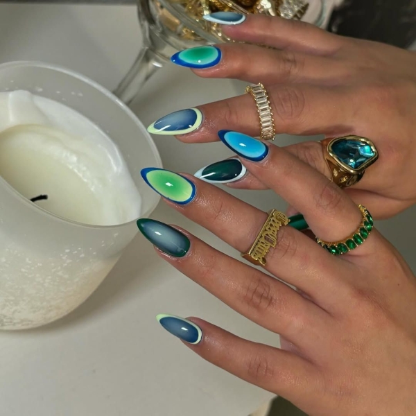 Aquarius season is upon us! For a celebratory manicure, consider shades of blues and purple, plus motifs that lean toward water and air. Scroll through 17 gorgeous Aquarius nail designs here.