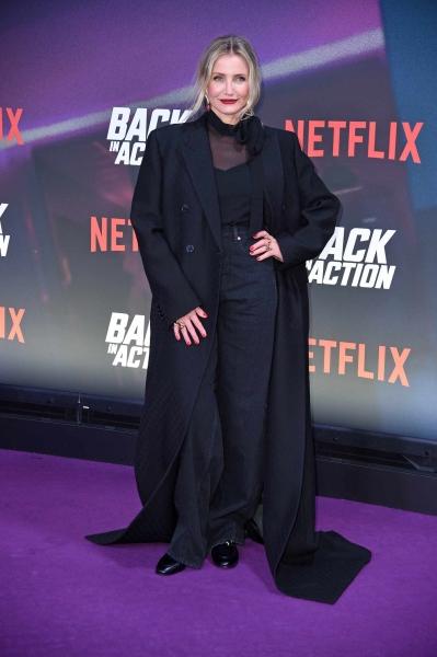 Cameron Diaz made her first red carpet appearance in five years on January 15, stepping out for a special screening of her upcoming movie 'Back in Action.' See her sheer pussy bow blouse and 'Matrix'-coded trench coat, here.