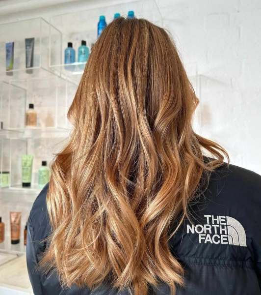 From Bordeaux red to golden honey blonde, explore warm hair color inspiration ahead of your next appointment, here.