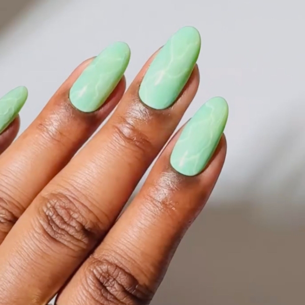 Professional manicurists suspect metallic accents, animal print, and shades of blue to be wildly popular in January. Here, explore their favorite January nail looks.