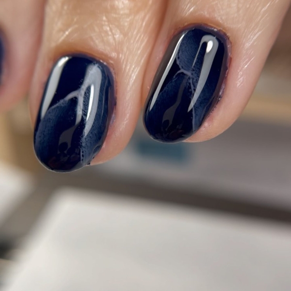 Professional manicurists suspect metallic accents, animal print, and shades of blue to be wildly popular in January. Here, explore their favorite January nail looks.