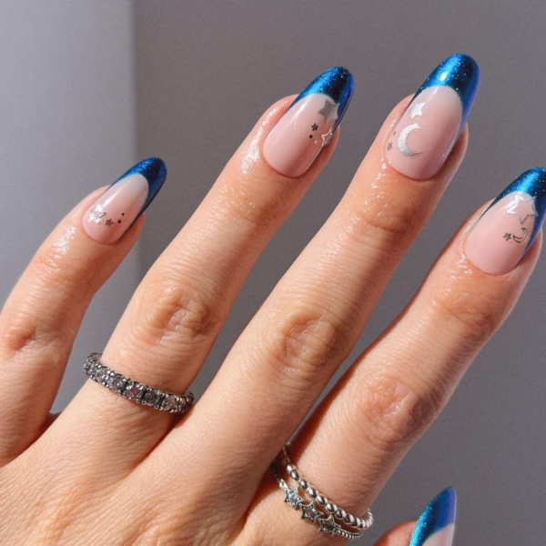 Professional manicurists suspect metallic accents, animal print, and shades of blue to be wildly popular in January. Here, explore their favorite January nail looks.