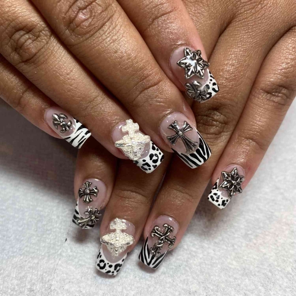 The early aughts were full of iconic beauty trends. In the nail art arena, square French manicures reigned supreme, alongside duck-shaped nails, animal prints and tattoo-inspired designs.