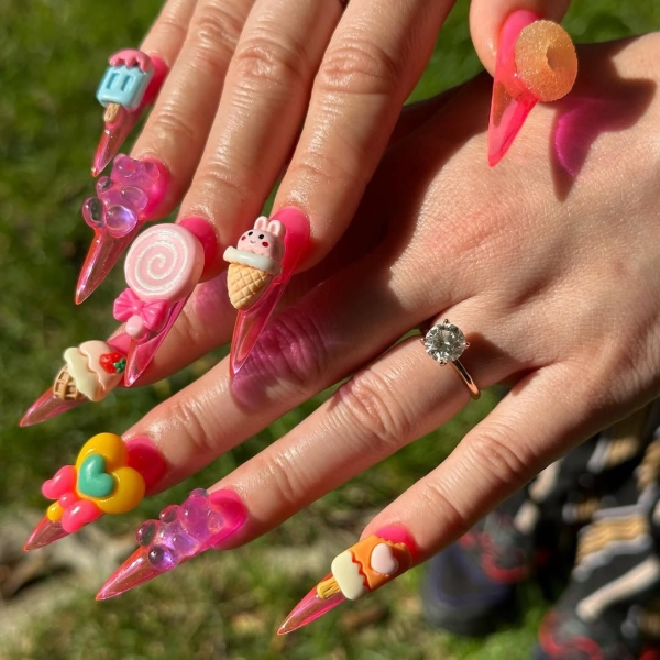 The early aughts were full of iconic beauty trends. In the nail art arena, square French manicures reigned supreme, alongside duck-shaped nails, animal prints and tattoo-inspired designs.