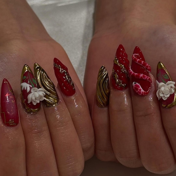 The Lunar New Year is celebrating the Year of the Snake, and we found the coolest serpent themed nail ideas that symbolize transformation and strength.