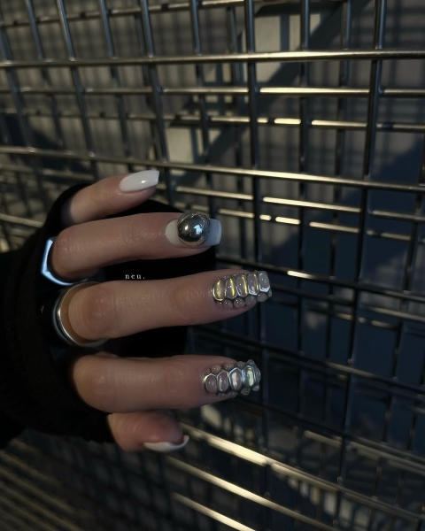 The Lunar New Year is celebrating the Year of the Snake, and we found the coolest serpent themed nail ideas that symbolize transformation and strength.