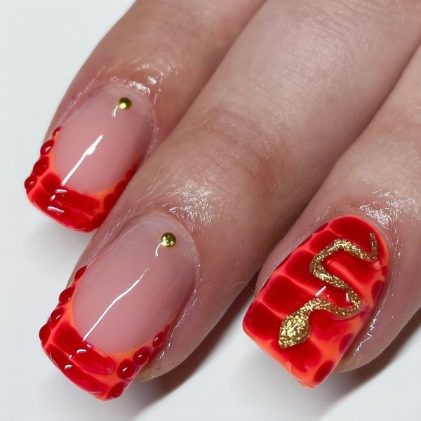 The Lunar New Year is celebrating the Year of the Snake, and we found the coolest serpent themed nail ideas that symbolize transformation and strength.