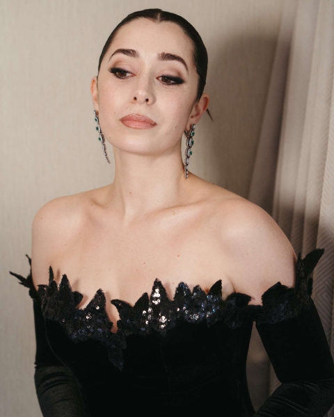 'The Penguin' star Cristin Milioti attended the 2025 Golden Globes in a custom black velvet Rodarte dress. See here for all the exclusive details on her red carpet look.