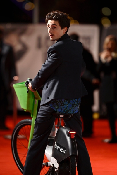 Timothée Chalamet Accessorizes His Premiere Outfit With a Lime Bike