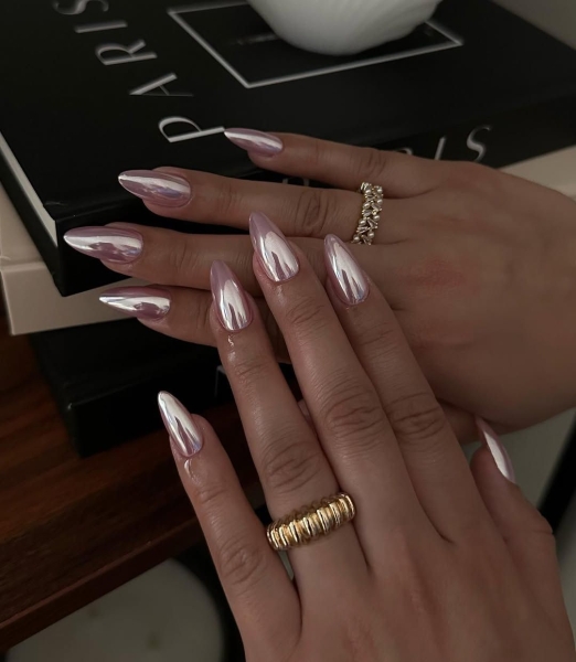 Whether you're putting chrome over a milky nude, a saturated color, or a clean French, it'll take your nails to the next level. Ahead of your next manicure, peruse some of our favorite winter chrome nail designs.