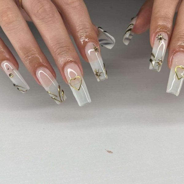 White ombré nails take the classic contrast of the French manicure and gives it a diffused and modern refresh. If you're looking for the best white ombré nails, here are 20 manicure ideas you're going to love.